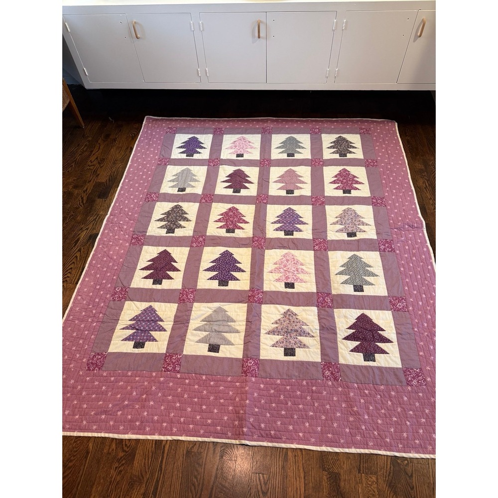 Quilt.  Hand quilted.